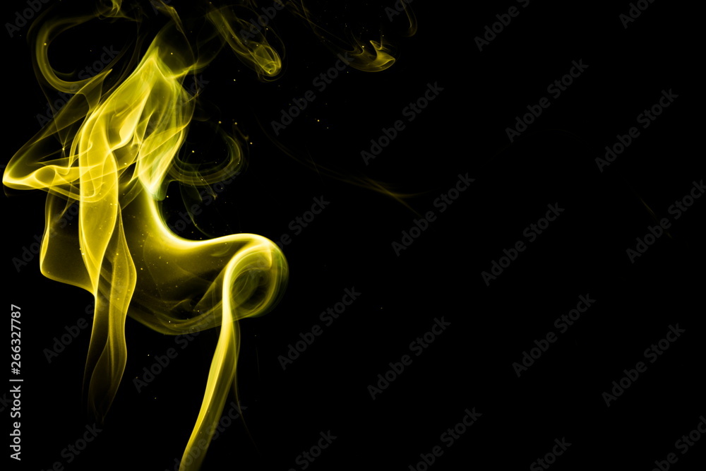 Yellow smoke on black background Yellow smoke on black background