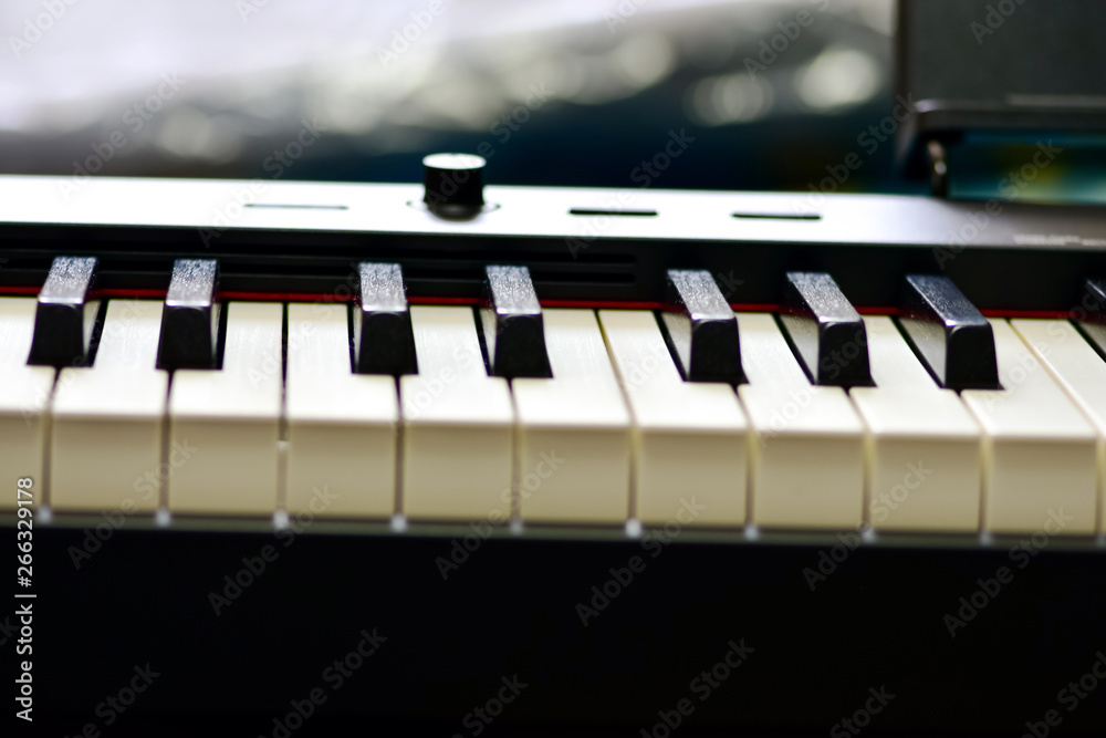 Keys of a digital piano, soft focusing, creative mood of a person improvisation and creativity. Midi piano keyboard for playing digital music and making remixes. Keys of a digital piano, soft focusing, creative mood of a person improvisation and creativity. Midi piano keyboard for playing digital music and making remixes.