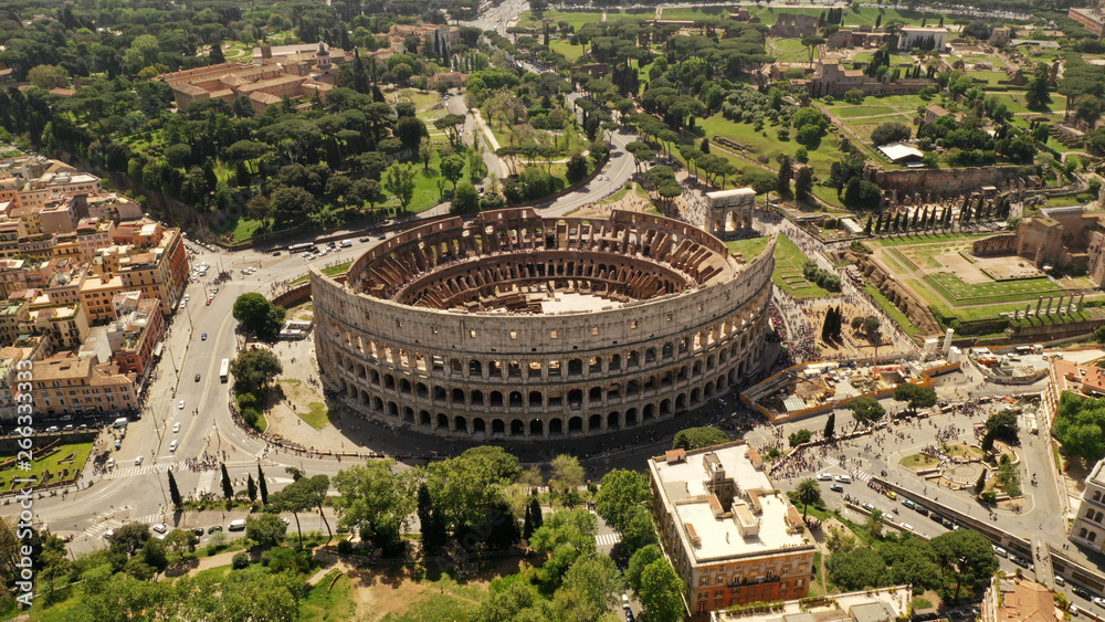 Aerial view on the Coliseum, Rome, Italy. Spring, summer. Ancient Rome architecture from drone.