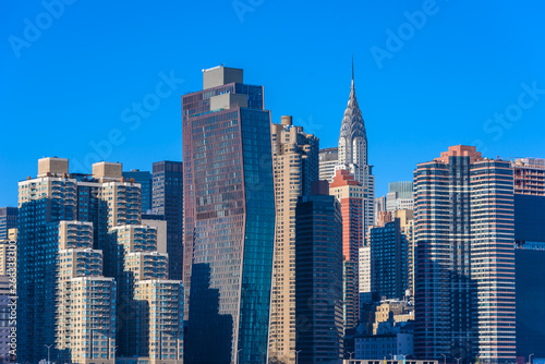 View from East Side River to Empire State Building - Manhatten Skyline of New York  USA