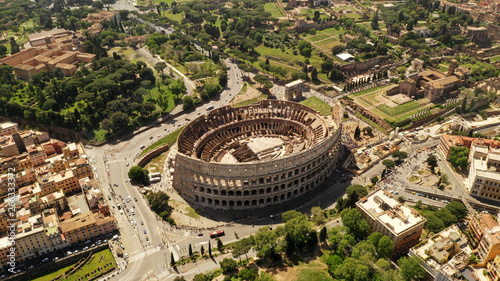 Aerial view on the Coliseum, Rome, Italy. Spring, summer. Ancient Rome architecture from drone.
