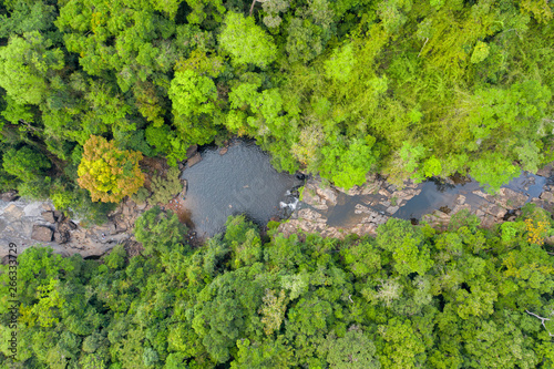 Aerial viewwaterfall in deep forest. Khlong Chao Waterfall in Koh Kood, Thailand