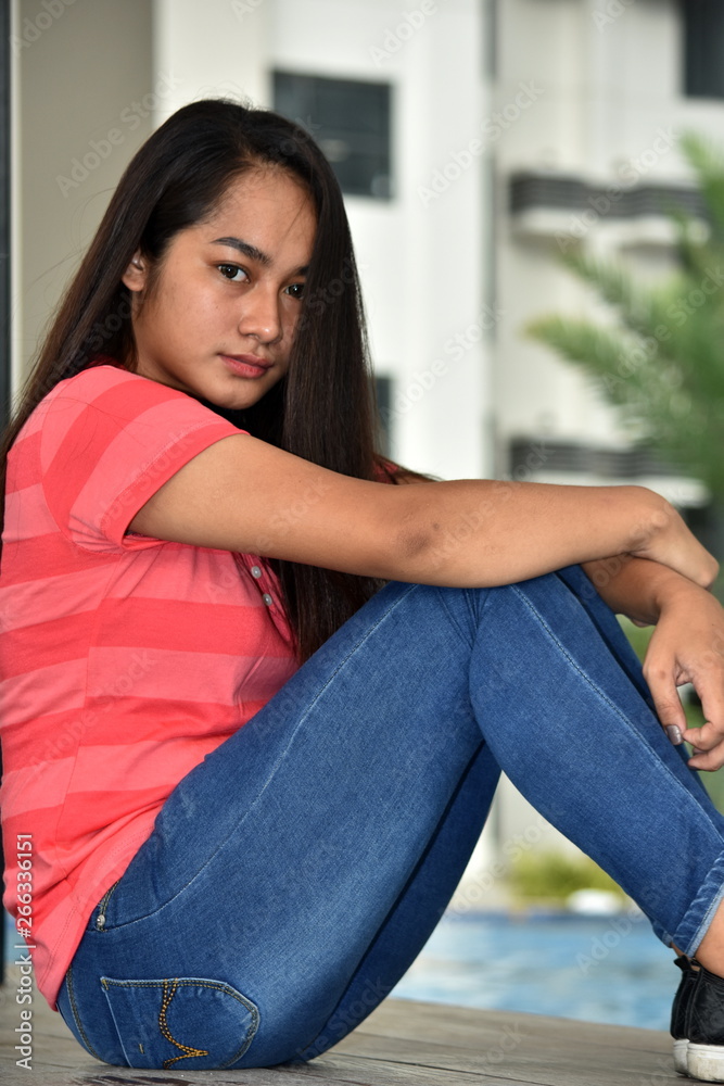 Unemotional Girl Youth Sitting By Pool Unemotional Girl Youth Sitting By Pool