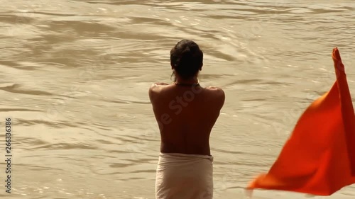  Yogi and Ganga . Yogic posture by the side of Ganga river.