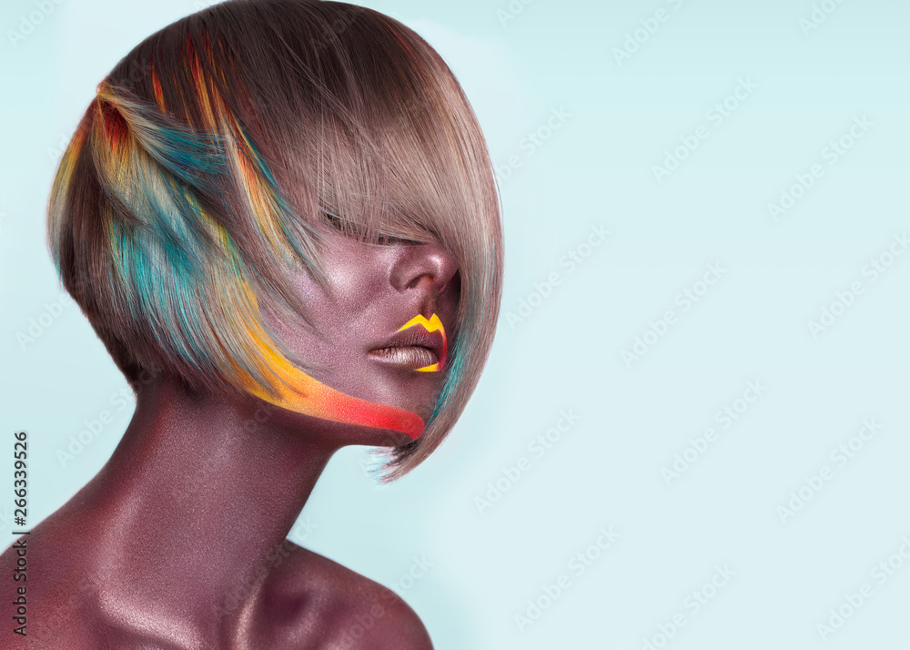 Naklejka premium Beautiful girl with multi-colored hair and creative make up and hairstyle. Beauty face.