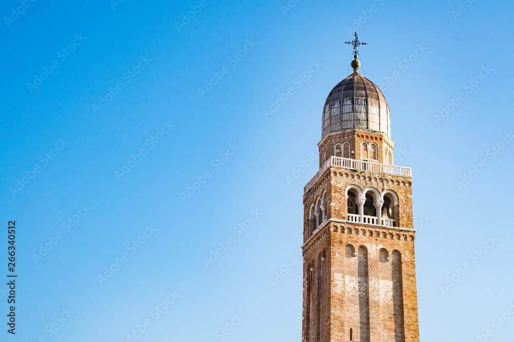 bell tower Chioggia, Italy, against blue sky
