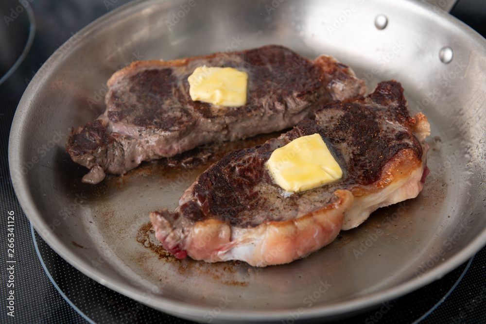 Grass Fed Juicy Steak on Skillet Grass Fed Juicy Steak on Skillet