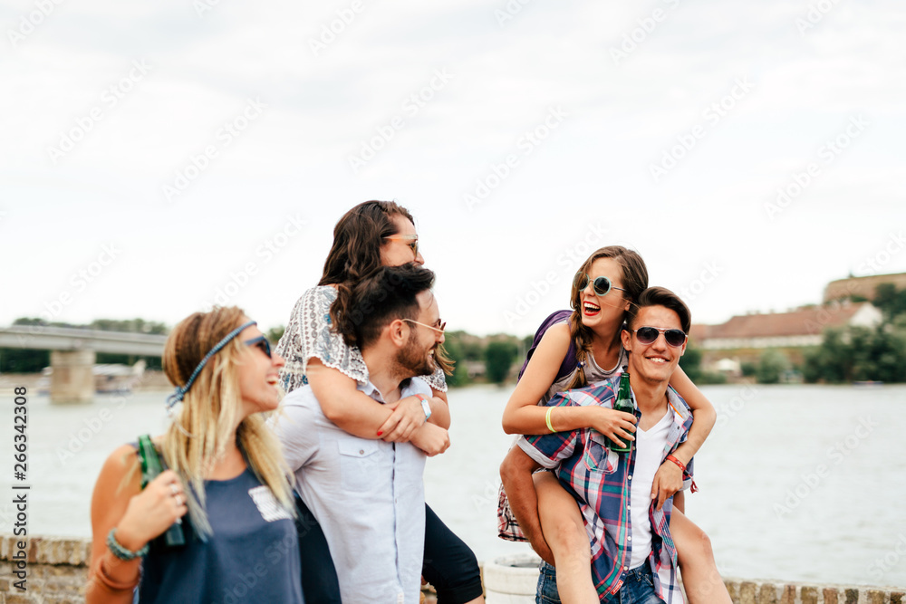 Group of young happy friends having fun time Group of young happy friends having fun time