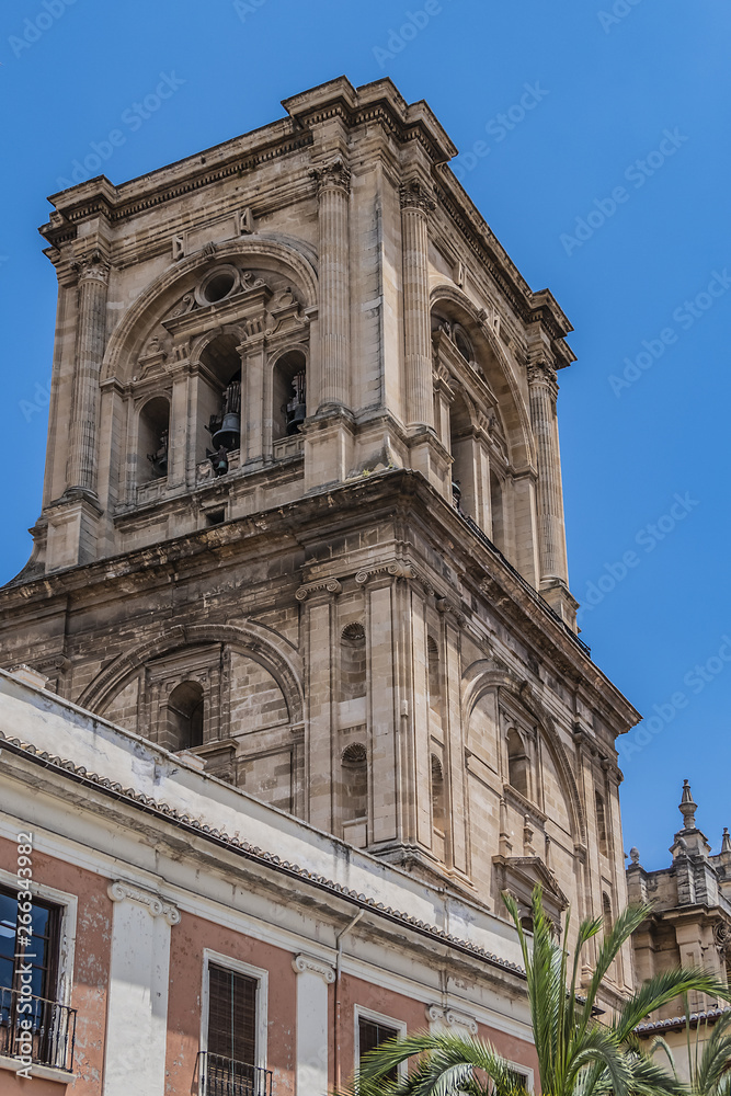 Bell tower of Roman Catholic Granada Cathedral or Cathedral of Incarnation (Catedral de Granada, Santa Iglesia Catedral Metropolitana de la Encarnacion de Granada, 1561). Granada, Andalusia, Spain.