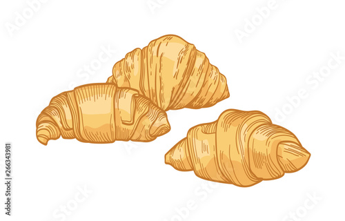 Fresh delicious croissants isolated on white background