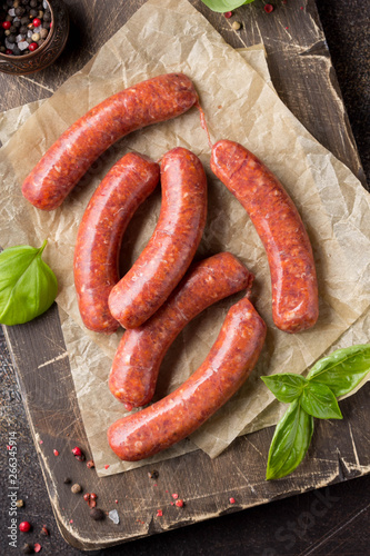 Raw grilled sausages with meat (beef, pork, lamb) and spices, hot merguez, kabanos, chorizo. Delicious food for picnic