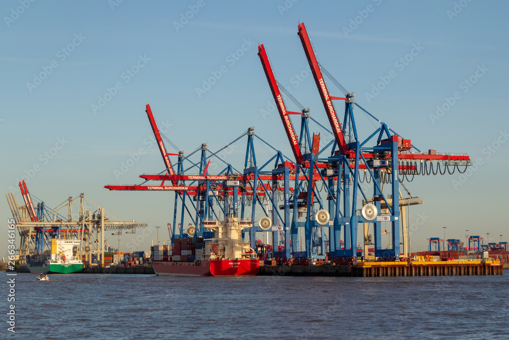 View from the river Elbe towards Terminal Burchardkai in the container harbor in Hamburg, Germany.