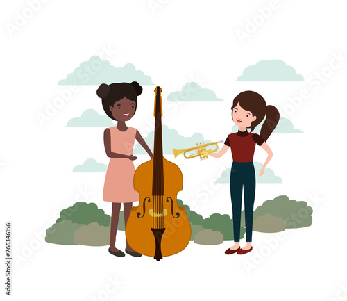 women with musical instruments in landscape