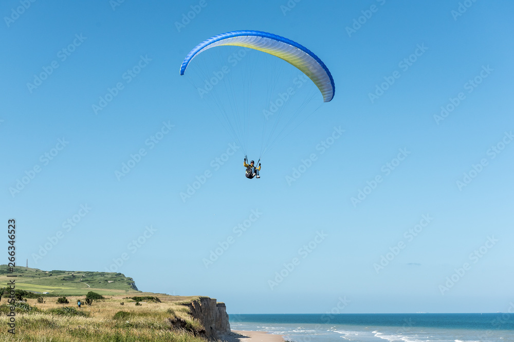 Paragliding above the cliff