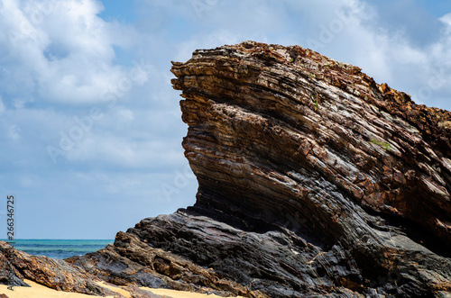 tropical sandy beach at sunny day.blue sky and torquise sea water. ideal for travel and vacation background photo