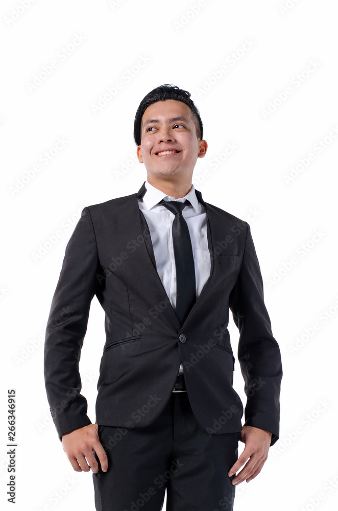 Studio portrait of handsome and confident young business man on white background