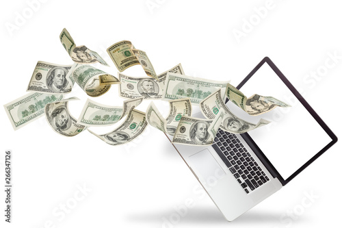 Money pouring out from a notebook computer