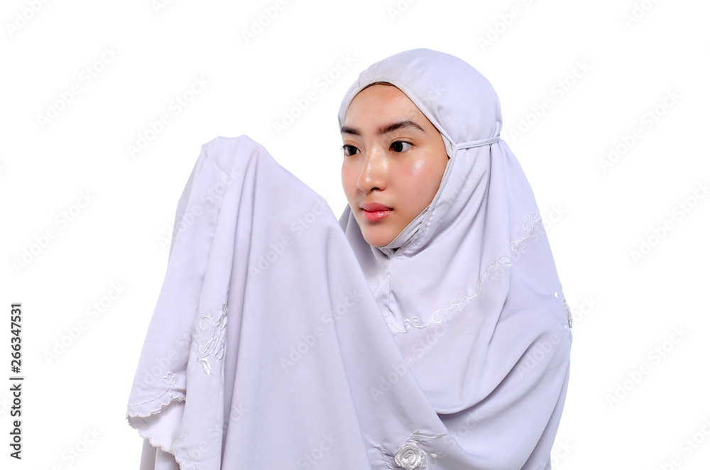 concept for eid mubarak and soul fasting of islamic ramadan, young female muslim with hijab praying concept for eid mubarak and soul fasting of islamic ramadan, young female muslim with hijab praying