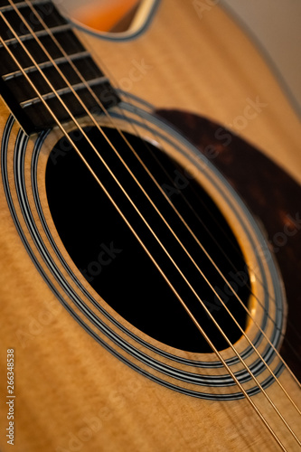 close up of an acoustic guitar playing classical play folk string band art hole object macro ukelele bass