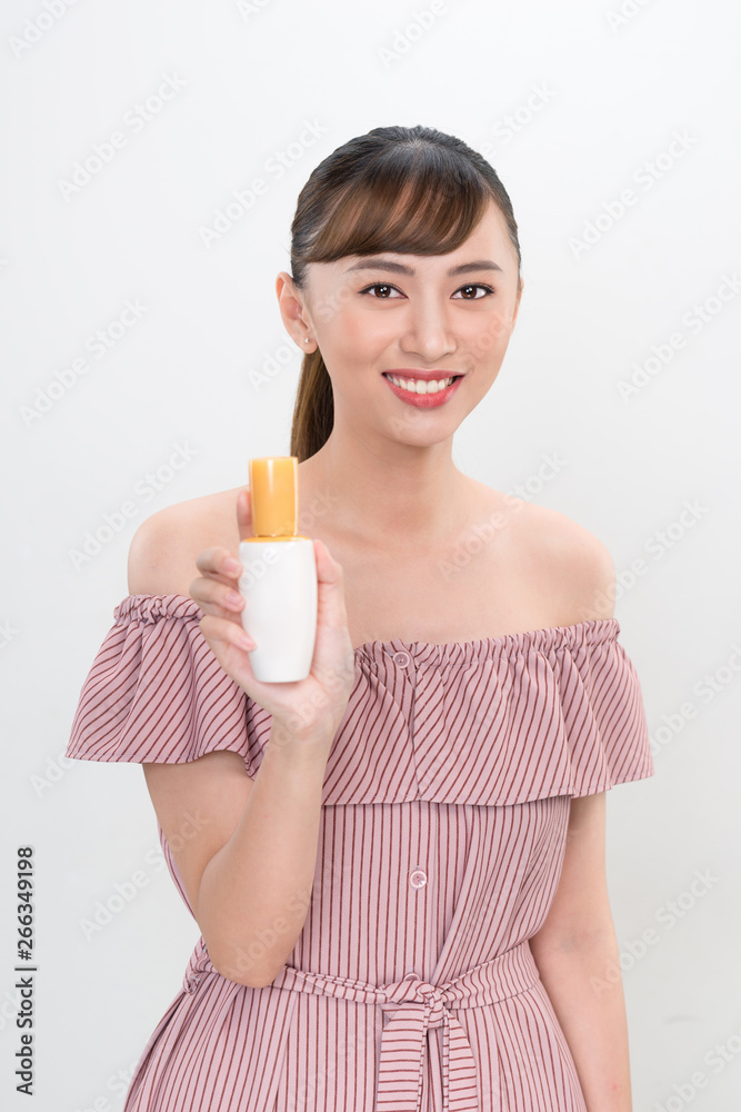 asian woman showing cream on her hand, isolated on white asian woman showing cream on her hand, isolated on white