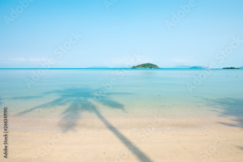 A tranquil tropical beach on sunny summer. 