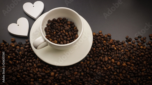 Coffe cup with coffee beans