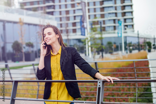 Businesswoman with a mobile...
