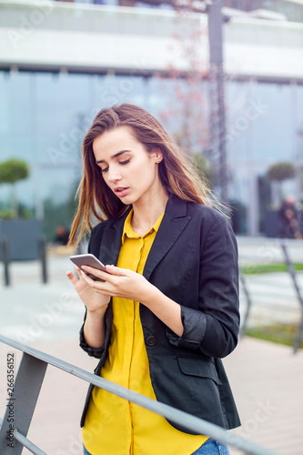 Businesswoman with a mobile...