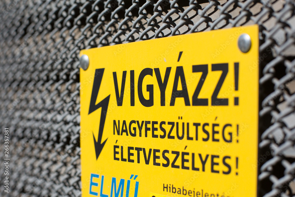Warning sign in Hungarian Danger high voltage! VIGYÁZZ