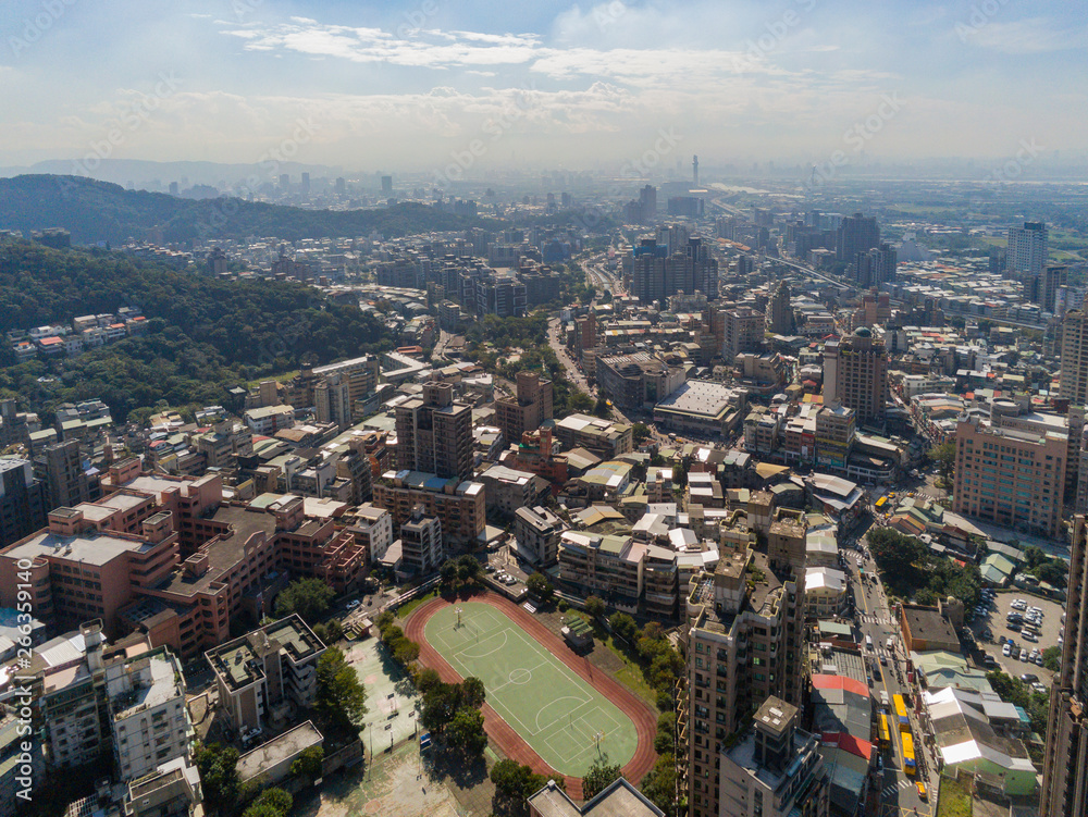 Aerial view of the metro line and cityscape of Xinbeitou area