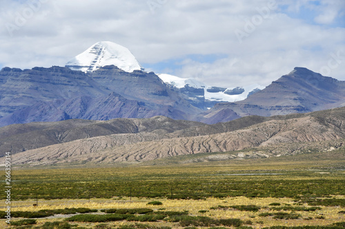 China, Tibet. South face of mount Kailash (Kailas) in the summer in cloudy day from the side of plateau of Bark photo