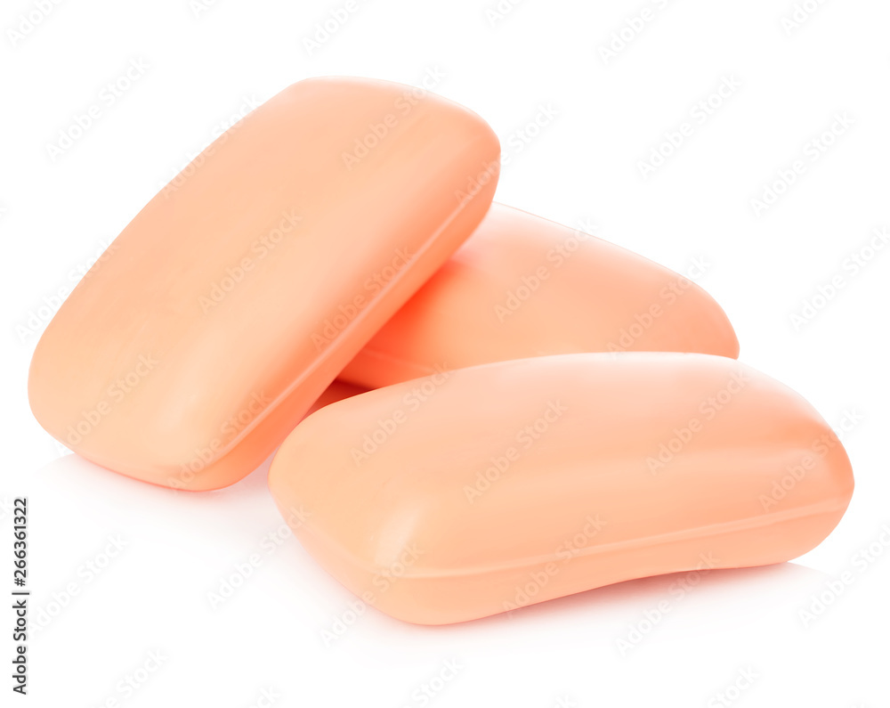 Pieces of orange soap isolated on white background. Pieces of orange soap isolated on white background.