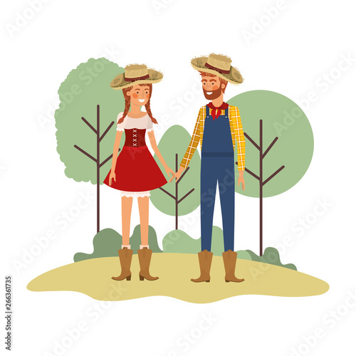 farmers couple talking with straw hat in landscape