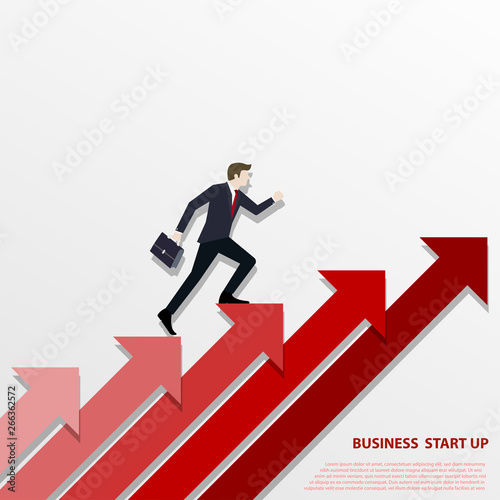 Businessman walking up on red arrow