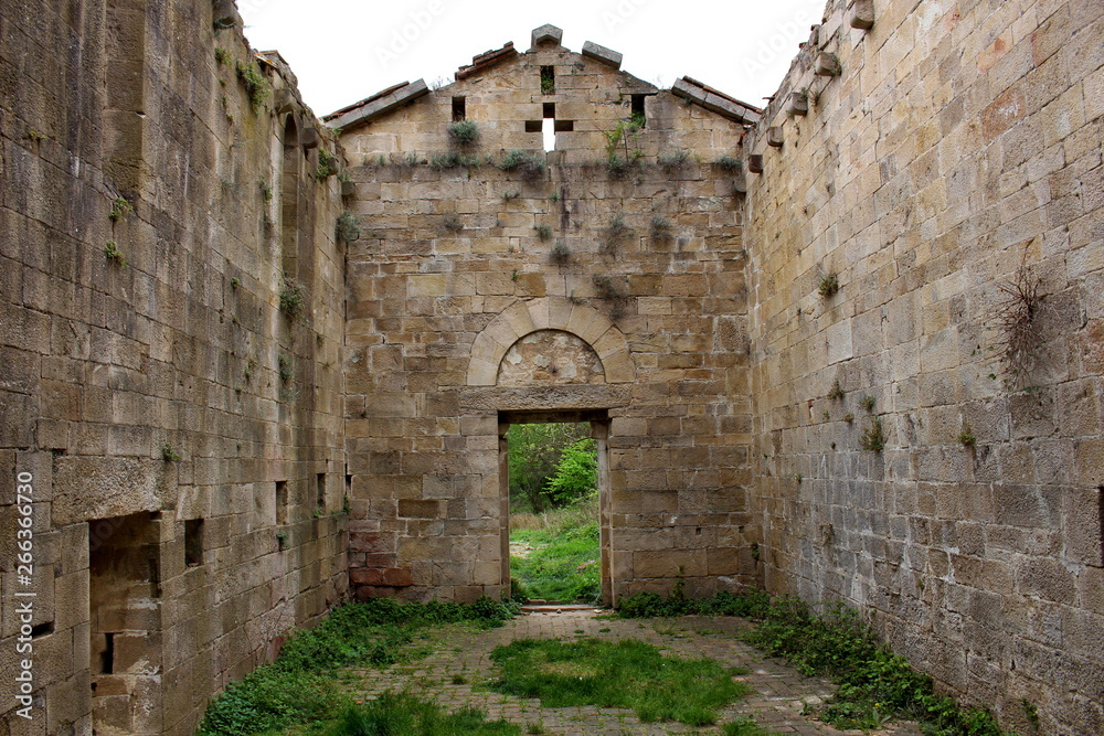 the interior of the Church of Santa Maria di Mirteto in the abandoned monastic village in the Pisan mountains above Asciano