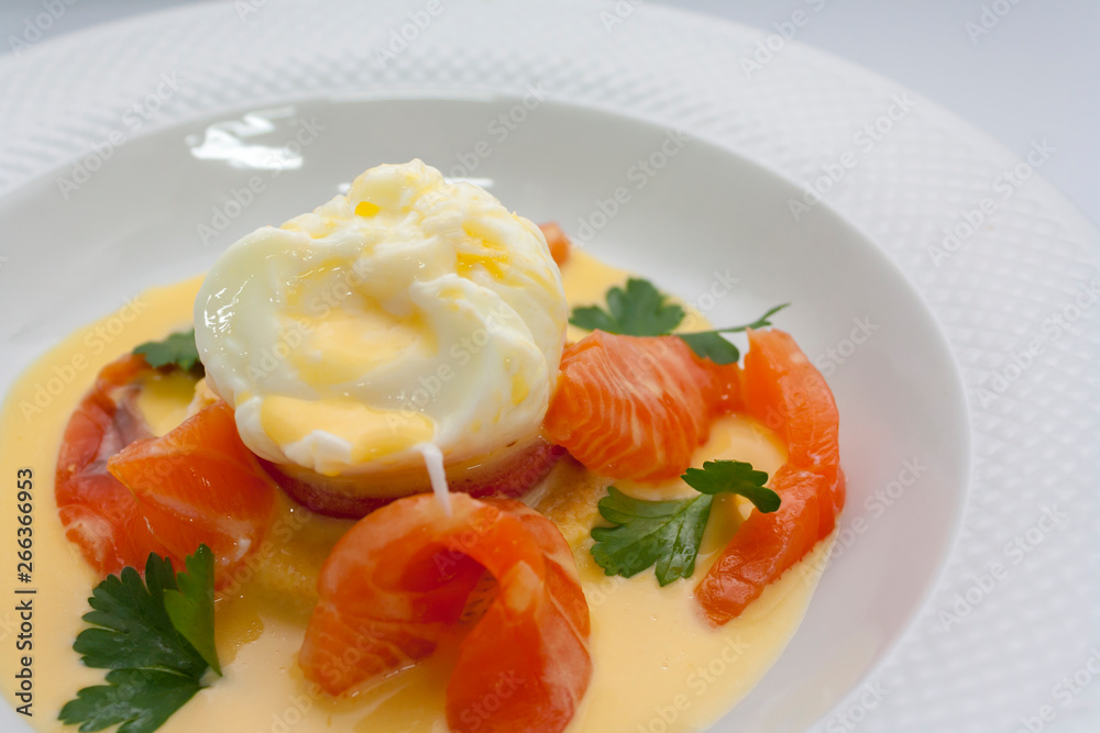 poached egg on fresh tomato and thinly sliced salmon poached egg on fresh tomato and thinly sliced salmon