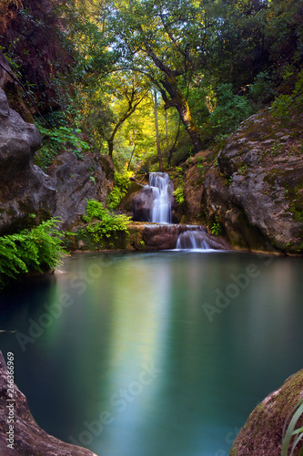 Stunning waterfalls with small emerald lake in deep green forest in Manavgat, Antalya, Turkey
