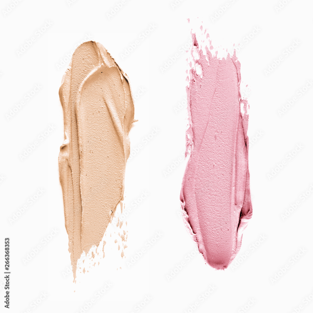 Fototapeta premium Pink and Beige Make-up two smudges on isolated background 