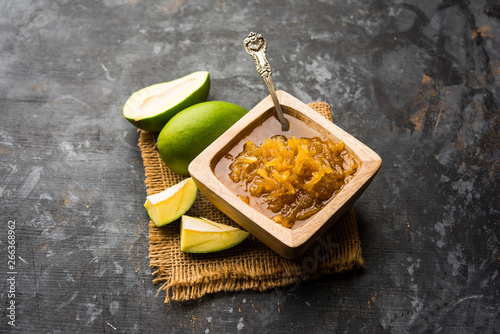 Mango Chunda or Sakhar Amba is a traditional indian summer recipe made using accha aam preserved in sugar syrup for days. selective focus photo