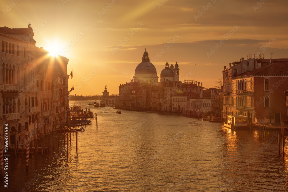 Beautiful sunrise over the canale grande in Venice, italy with the Santa Maria in the background