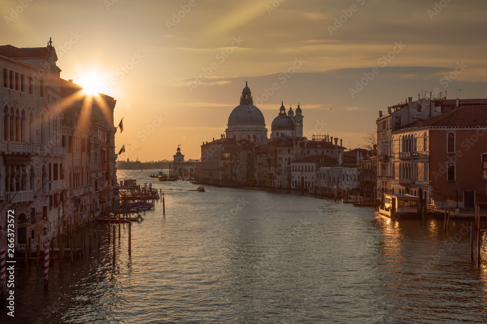 Beautiful sunrise over the canale grande in Venice, italy with the Santa Maria in the background