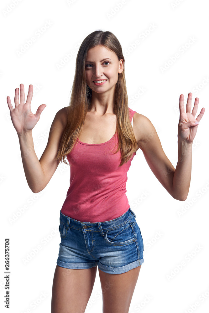 Happy woman in shorts showing nine fingers Happy woman in shorts showing nine fingers