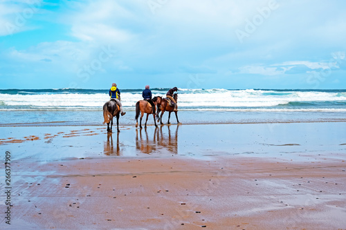 Horse riding at Carapateira beach in the Algarve Portugal