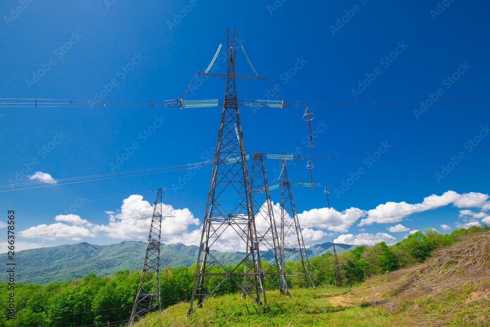 Electricity steel pylon, summer rural landscape Electricity steel pylon, summer rural landscape