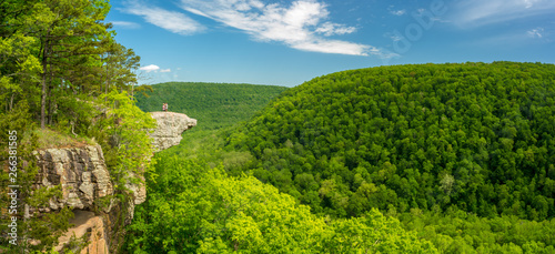 Tourist visitors couple taking pictures at Whitaker Point rock cliff hiking trail, landscape view, Ozark mountains, nwa northwest arkansas © Sono Creative