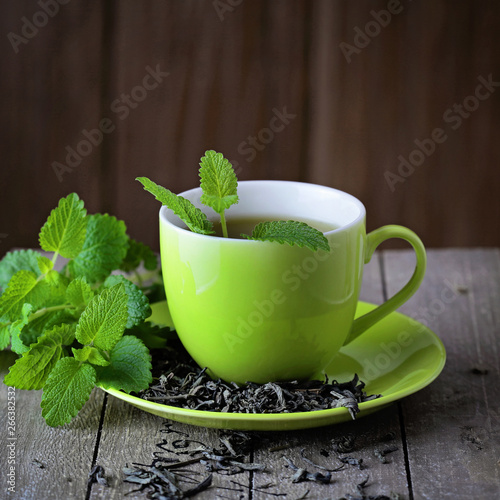 healthy green tea on wooden background