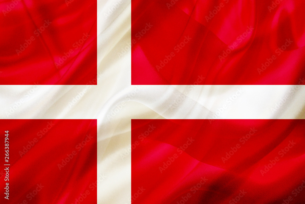 Fototapeta premium Denmark country flag on silk or silky waving texture