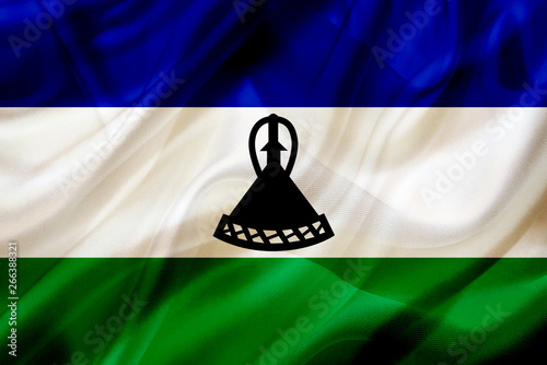 Lesotho country flag on silk or silky waving texture