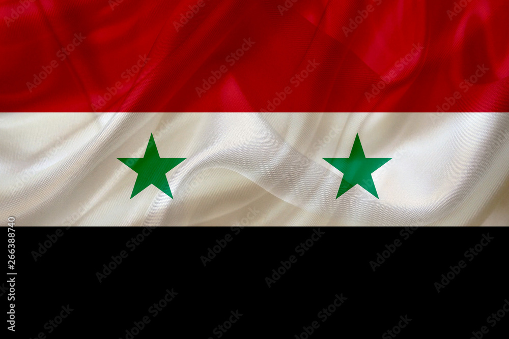 Syria country flag on silk or silky waving texture Syria country flag on silk or silky waving texture