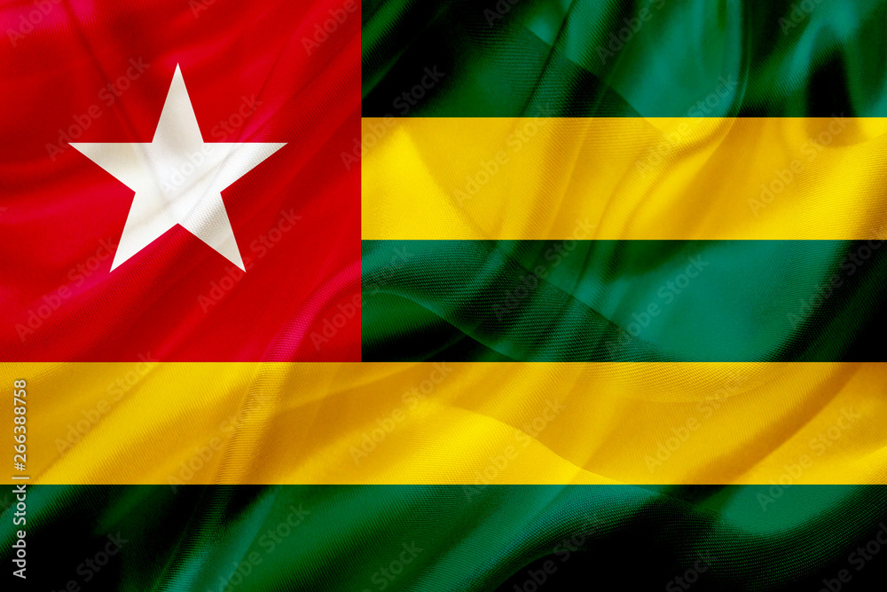 Togo country flag on silk or silky waving texture